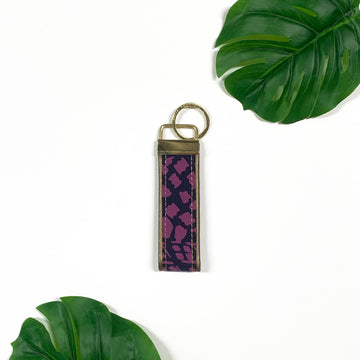 A lifestyle photo of batik keyfob in purple bintik