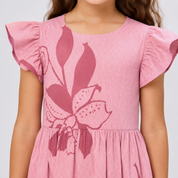 Closeup detail of girl in pink dress
