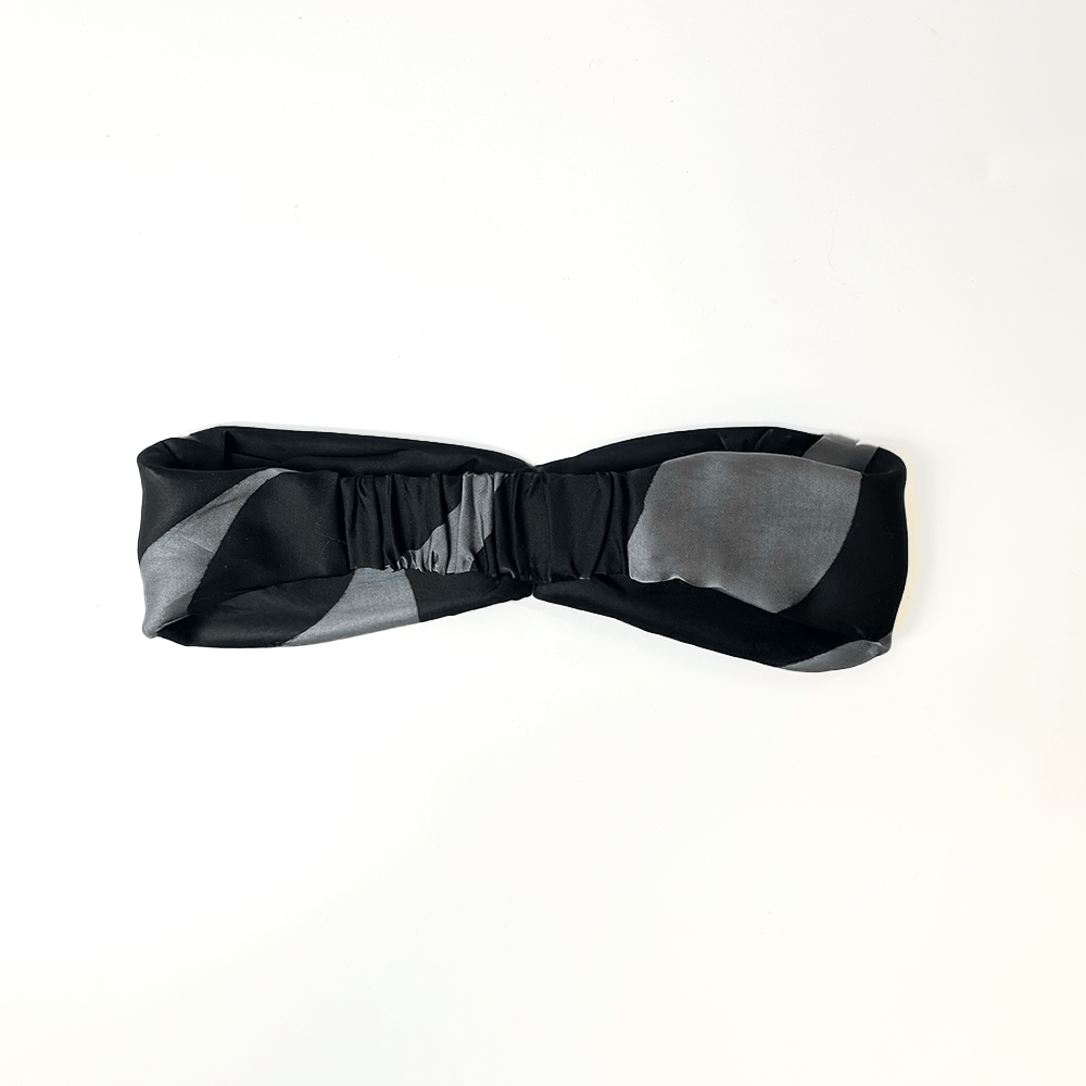 back view of Batik Boutique’s Jet Chain headband featuring elastic band for flexible fit, handcrafted from silk cotton batik.