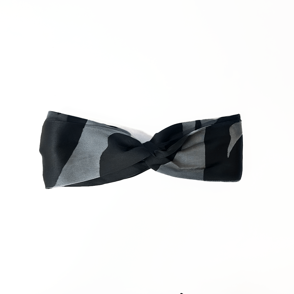 Front twisted view of Jet Chain batik headband in black and grey, made from premium silk cotton by Batik Boutique