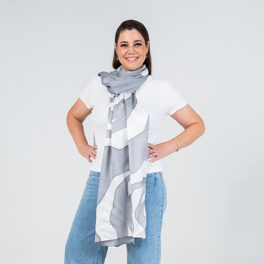 women wearing the silver rose scarf in a lifestyle photo 