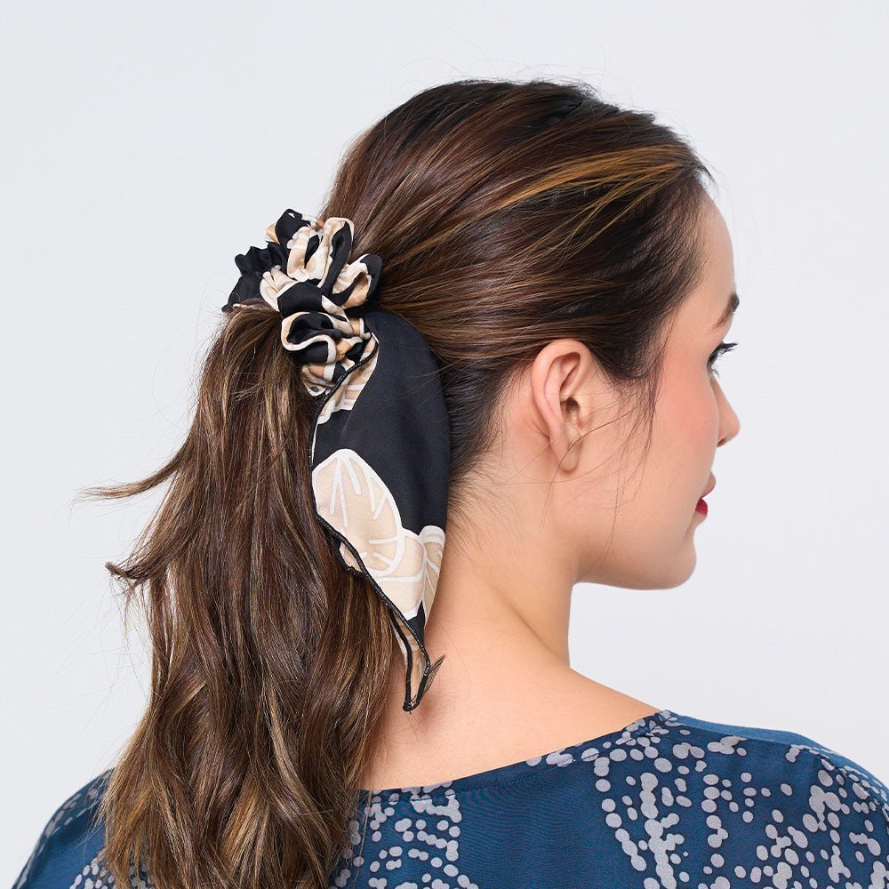 photot of women Batik Scrunchies - Onyx Fleur being worn 
