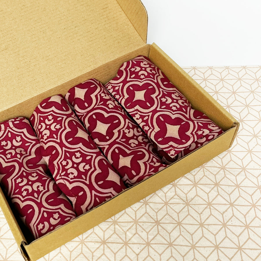 A photo of batik serviette set in a craft brown box 
