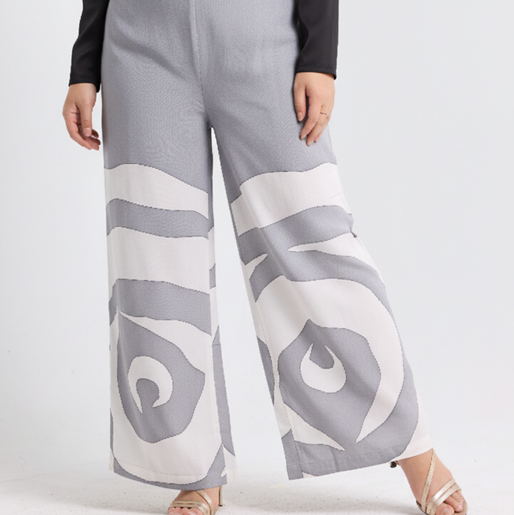 Person wearing gray and white patterned wide-leg pants on a white 
SilverRoseTrouserbackground