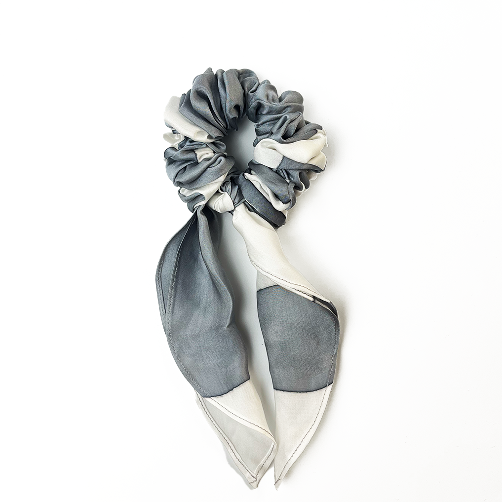 Silver Rose batik scrunchie with ribbon tail on white background.