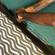 artisan photo of the Men's Long-Sleeved Batik Shirt - Teal Snakeskin 