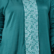 Teal outfit with a patterned scarf