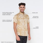 a batik shirt against a white background in the pattern tan orchid