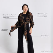 Woman wearing a patterned scarf with text on a white background