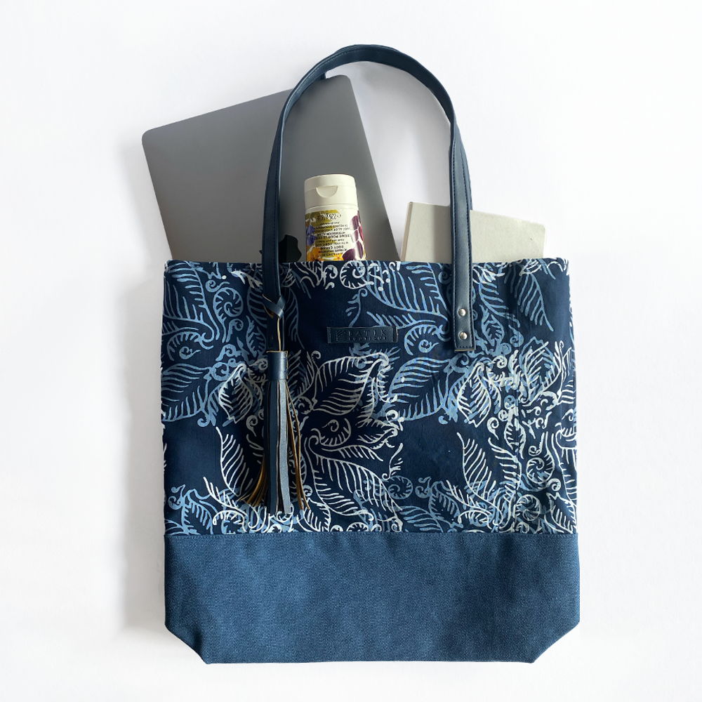 a flatlay photo batik tote bag in blue nautical fern lay on top of white background