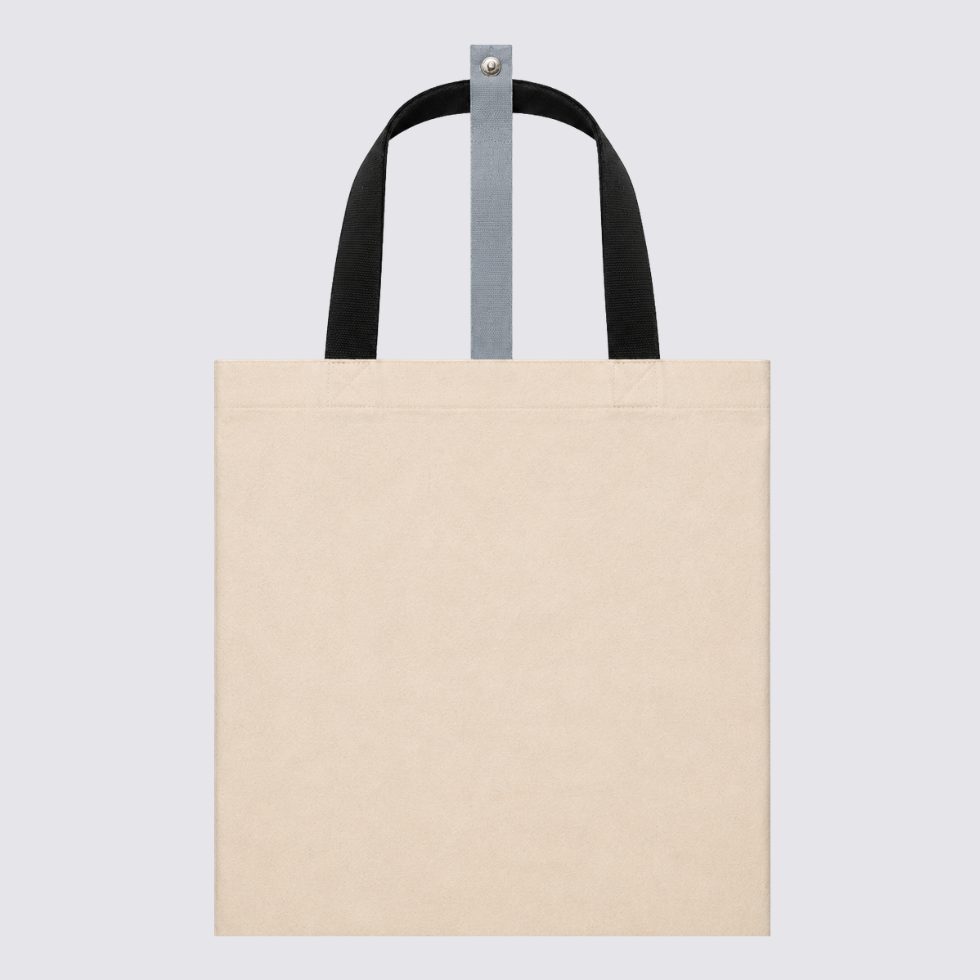 Front of totebag with gray-ish KL inspired prints