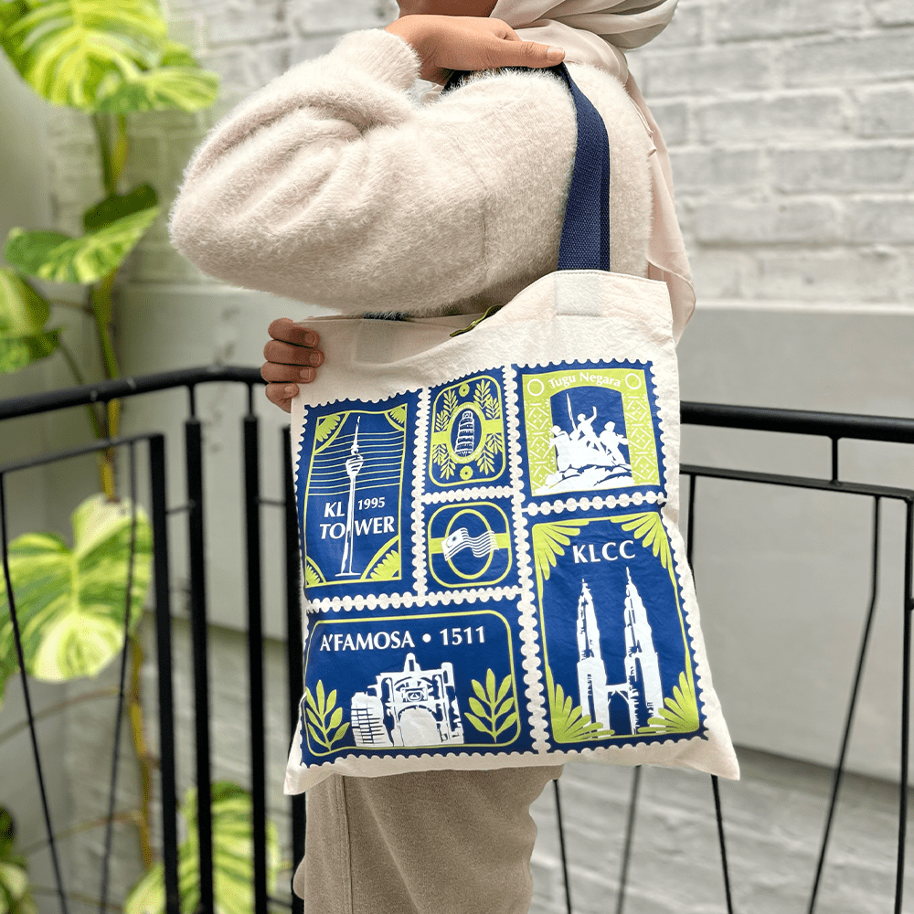 tote bags in the pattern limau setem with iconic malaysian landmarks stamp motifs