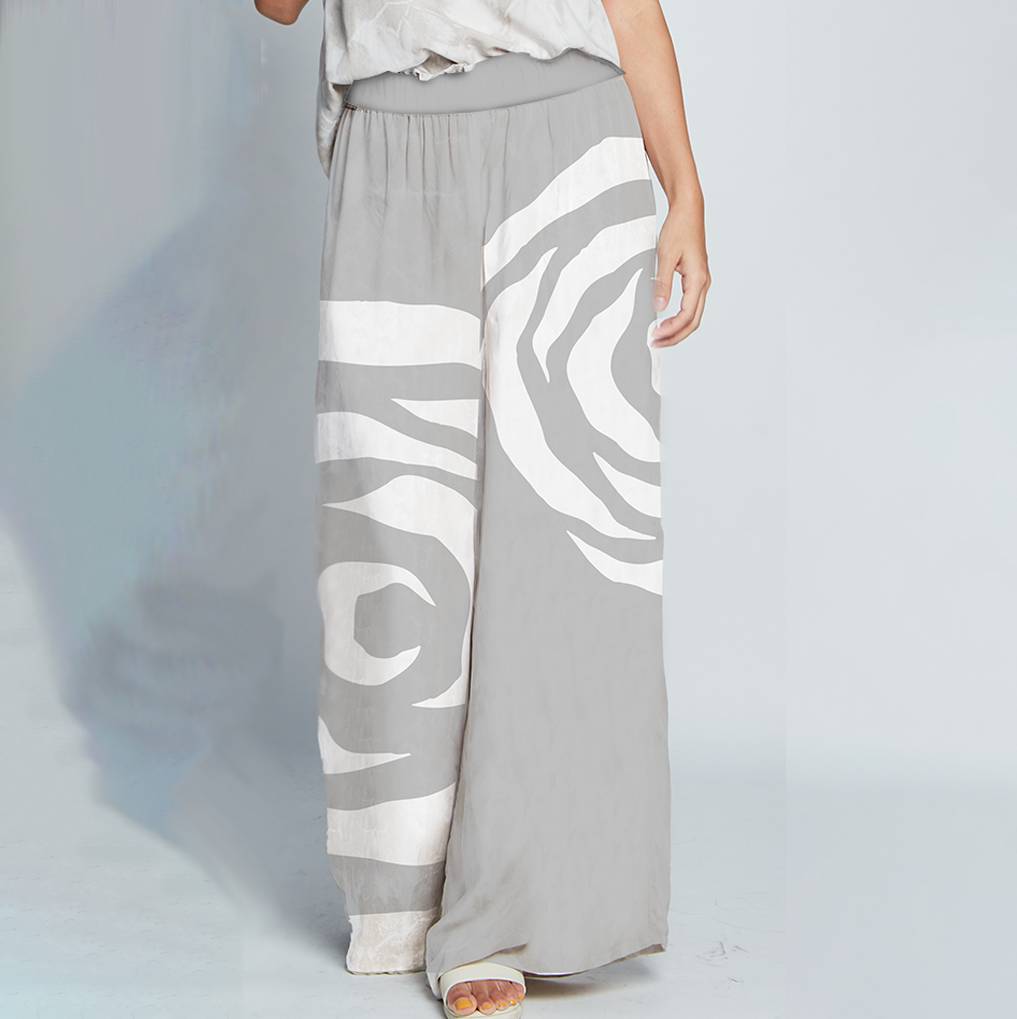 Detailed view of Silver Rose Batik wide leg trousers highlighting design features — flat front, side seam pockets, breathable fabric, and relaxed cut inspired by Malaysia’s batik heritage.