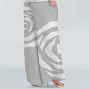 Back view of the wide leg Silver Rose Trousers. Comfy and flowy for a versatile look whether your getting ready for a meeting or going for a lunch . Showcasing the pockets in 