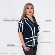 a woman posing in front of a white background in a batik cuban for women in the pattern navy brush