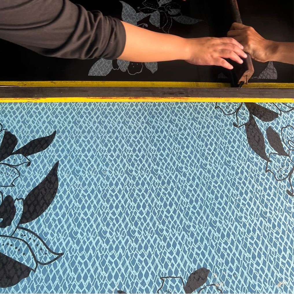 Artisan photo of blooming lace print being  crafted 