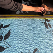 Artisan photo of blooming lace print being  crafted 