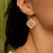 close up photo of the woven leaves double layered earrings 