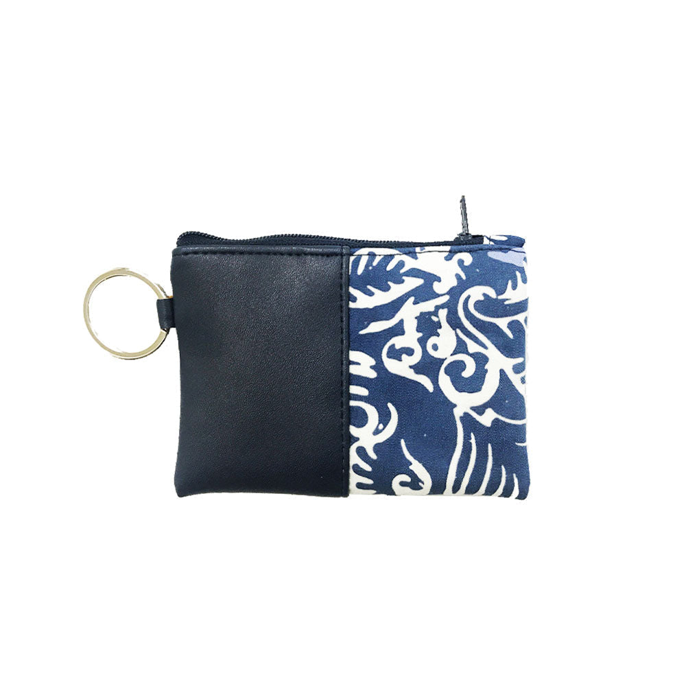 an upview whitebox photo of batik card holder wallet in blue nautical fern pattern showing the back side of the wallet