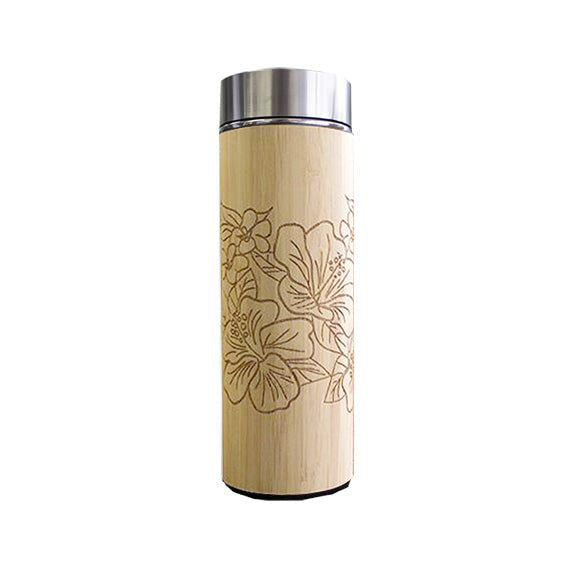 white box photo of wooden tumbler inspired from batik in hibiscus pattern