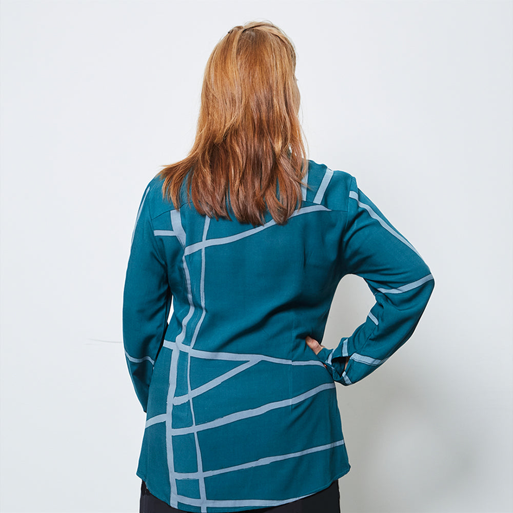 Woman from the back wearing Batik Shirt in Forest Green brush color tone, handcrafted in Malaysia by Batik Boutique.