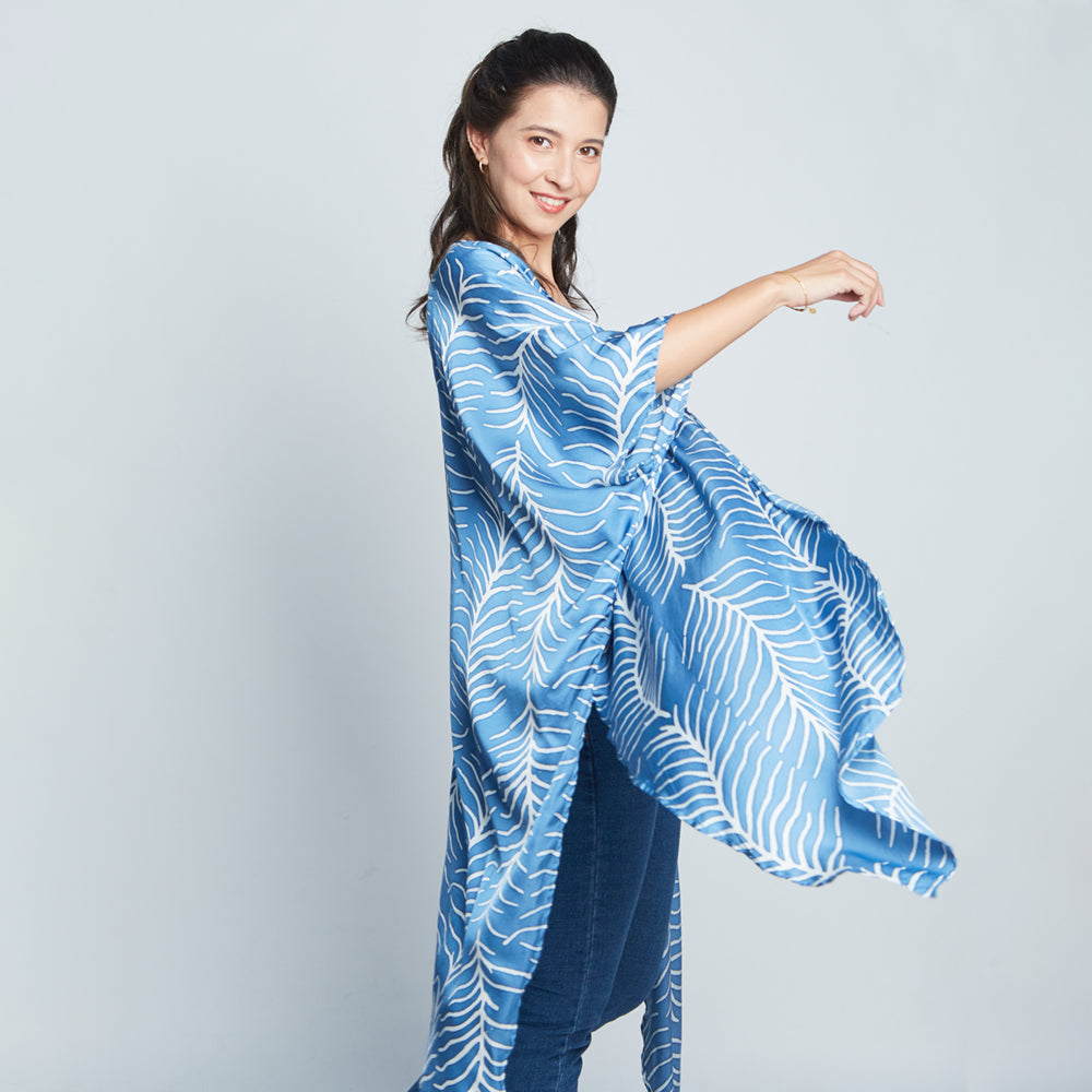 Model showcasing cotton silk batik Kimono in Cobalt Fern, handcrafted in Malaysia.