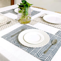 a batik placemat set and coasters are presented charmingly in a lifestyle photo