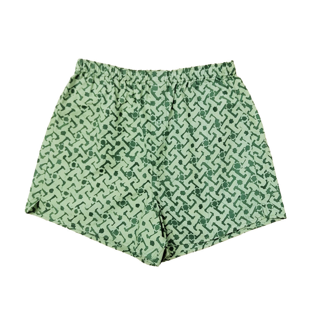 A whitebox photo of batik boxer in forest arabesque showing frontside of the boxer
