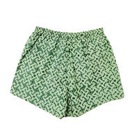 A whitebox photo of batik boxer in forest arabesque showing backside of the boxer