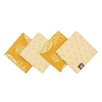 a photo of reversible coasters against a white background in the pattern golden pineapple