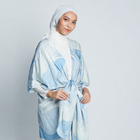 Female model in blue Sky Bukit batik kimono from Batik Boutique inspired by Malaysia's hills.