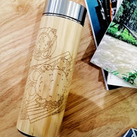 A captivating lifestyle photograph featuring a wooden tumbler engraved with the delightful image of Nasi Lemak